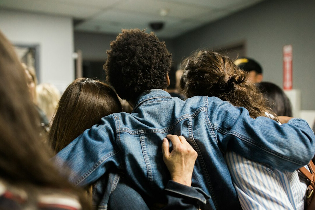 Group of diverse adults collaborating in a personal development workshop